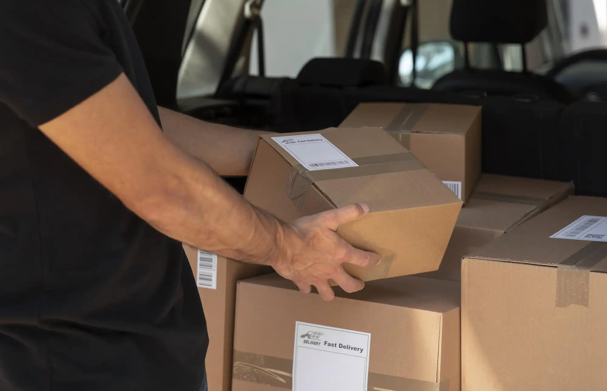 Courier Handling Packages for Delivery